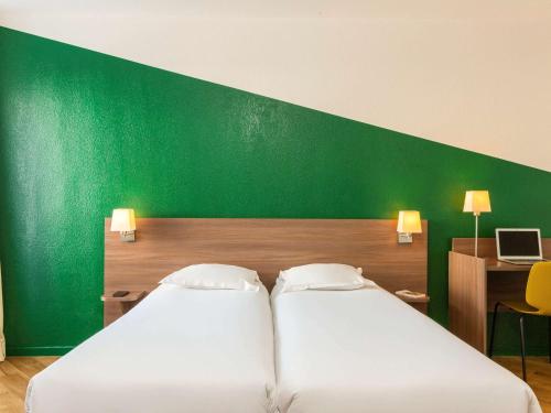 Imagen de la habitación del Aparthotel Adagio Access Carri&egrave;res-sous-poissy. Foto 18