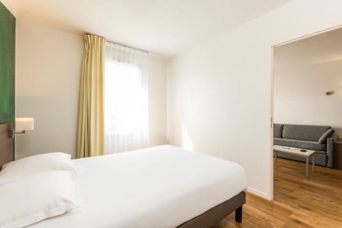 Imagen de la habitación del Aparthotel Adagio Access Carri&egrave;res-sous-poissy. Foto 19