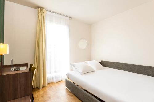 Imagen de la habitación del Aparthotel Adagio Access Carri&egrave;res-sous-poissy. Foto 20