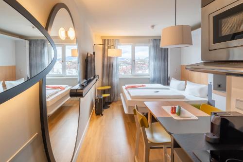 Imagen de la habitación del Aparthotel Adagio Access Freiburg. Foto 4