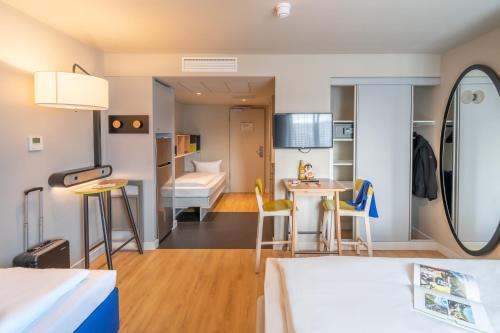 Imagen de la habitación del Aparthotel Adagio Access Freiburg. Foto 6