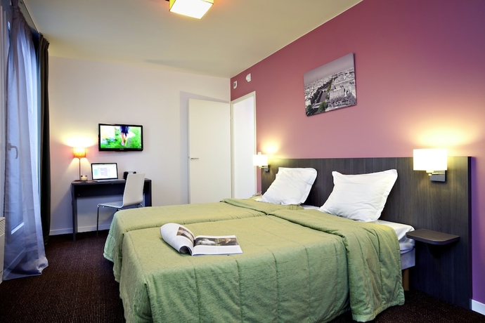 Imagen de la habitación del Aparthotel Adagio Access Paris Asni&egrave;res Aparthotel. Foto 3