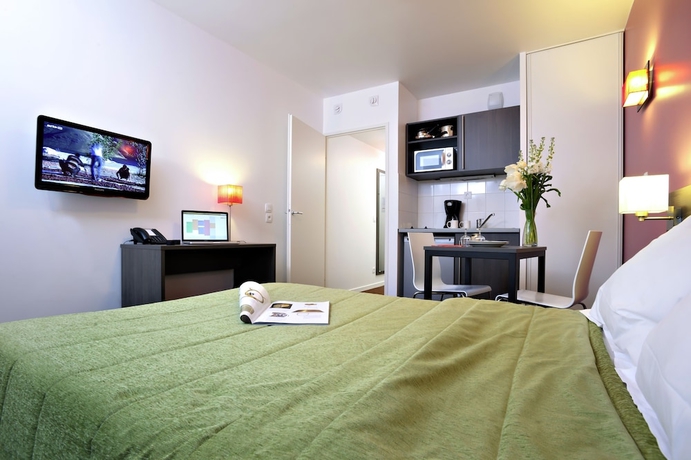 Imagen de la habitación del Aparthotel Adagio Access Paris Asni&egrave;res Aparthotel. Foto 4