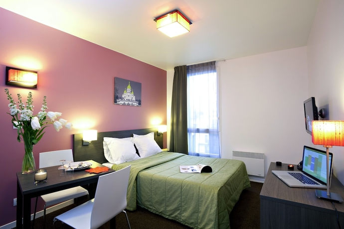 Imagen de la habitación del Aparthotel Adagio Access Paris Asni&egrave;res Aparthotel. Foto 5