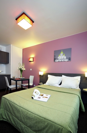 Imagen de la habitación del Aparthotel Adagio Access Paris Asni&egrave;res Aparthotel. Foto 6