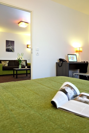 Imagen de la habitación del Aparthotel Adagio Access Paris Asni&egrave;res Aparthotel. Foto 8