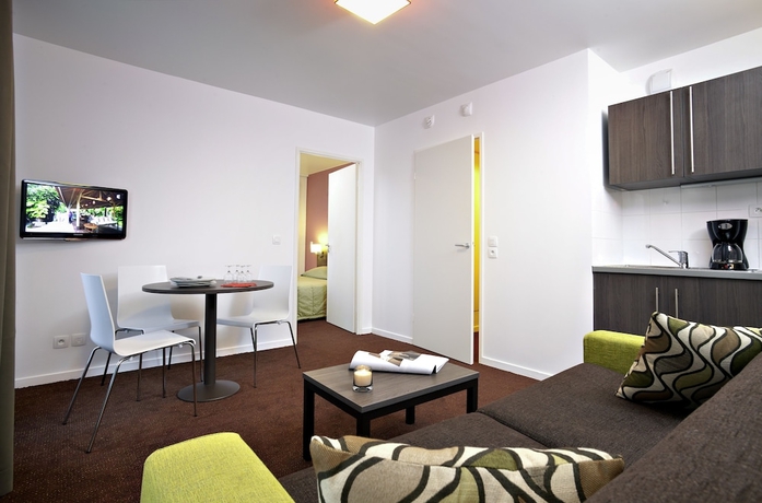Imagen de la habitación del Aparthotel Adagio Access Paris Asni&egrave;res Aparthotel. Foto 9