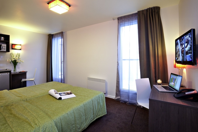 Imagen de la habitación del Aparthotel Adagio Access Paris Asni&egrave;res Aparthotel. Foto 10