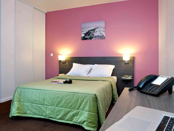 Imagen de la habitación del Aparthotel Adagio Access Paris Asni&egrave;res Aparthotel. Foto 12
