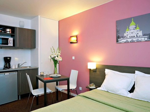 Imagen de la habitación del Aparthotel Adagio Access Paris Asni&egrave;res Aparthotel. Foto 13