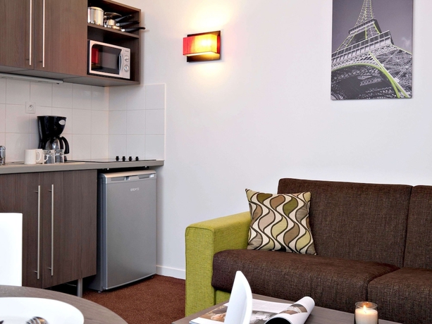 Imagen de la habitación del Aparthotel Adagio Access Paris Asni&egrave;res Aparthotel. Foto 14
