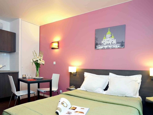 Imagen de la habitación del Aparthotel Adagio Access Paris Asni&egrave;res Aparthotel. Foto 15