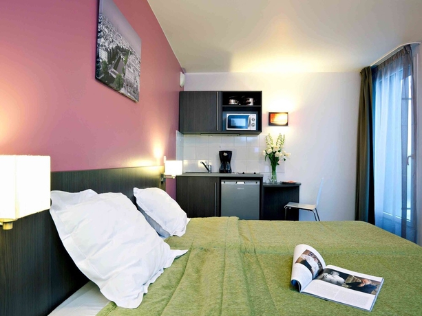 Imagen de la habitación del Aparthotel Adagio Access Paris Asni&egrave;res Aparthotel. Foto 17
