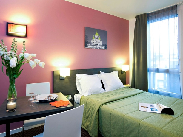 Imagen de la habitación del Aparthotel Adagio Access Paris Asni&egrave;res Aparthotel. Foto 18