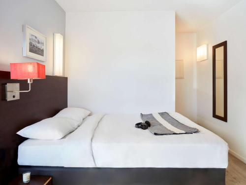 Imagen de la habitación del Aparthotel Adagio Access Paris Bastille. Foto 17