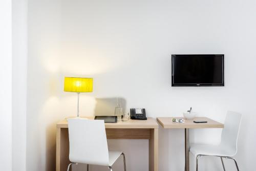 Imagen de la habitación del Aparthotel Adagio Access Paris Clichy. Foto 12