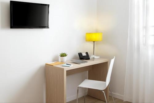 Imagen de la habitación del Aparthotel Adagio Access Paris Clichy. Foto 13