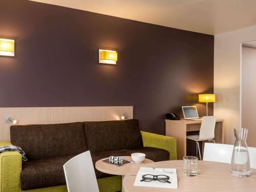 Imagen de la habitación del Aparthotel Adagio Access Paris Clichy. Foto 14