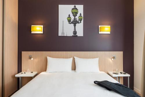 Imagen de la habitación del Aparthotel Adagio Access Paris Clichy. Foto 15