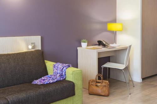 Imagen de la habitación del Aparthotel Adagio Access Paris Clichy. Foto 16