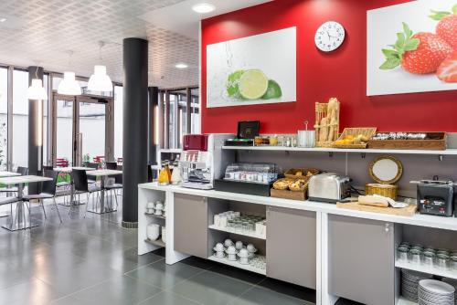 Imagen del bar/restaurante del Aparthotel Adagio Access Paris Clichy. Foto 10