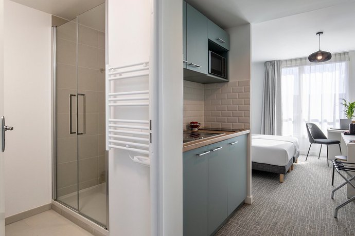 Imagen de la habitación del Aparthotel Adagio Access Paris Nanterre. Foto 2