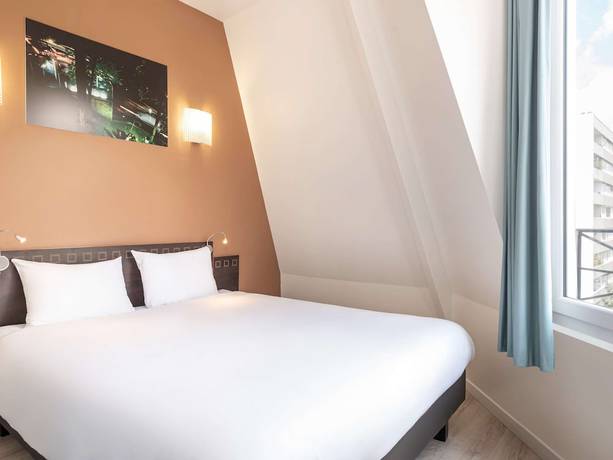 Imagen de la habitación del Aparthotel Adagio Access Paris Philippe Auguste. Foto 6