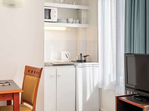 Imagen de la habitación del Aparthotel Adagio Access Paris Philippe Auguste. Foto 7