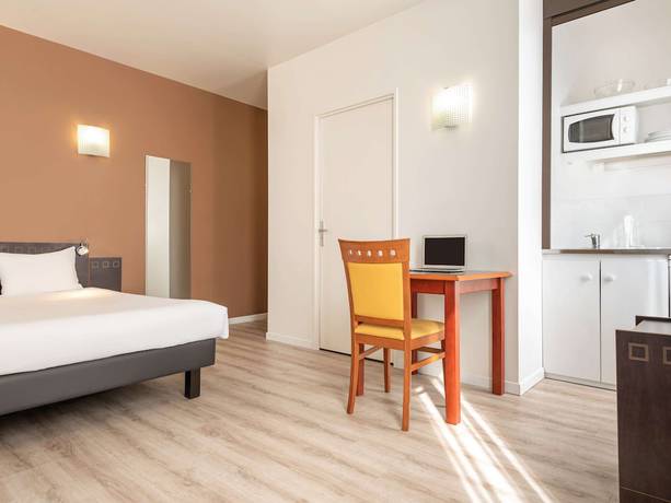 Imagen de la habitación del Aparthotel Adagio Access Paris Philippe Auguste. Foto 8