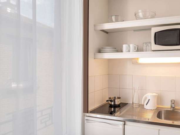 Imagen de la habitación del Aparthotel Adagio Access Paris Philippe Auguste. Foto 10