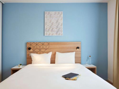Imagen de la habitación del Aparthotel Adagio Access Paris Quai D'ivry. Foto 8