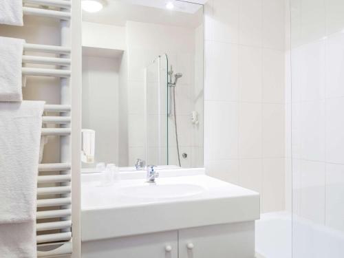 Imagen de la habitación del Aparthotel Adagio Access Paris Quai D'ivry. Foto 11