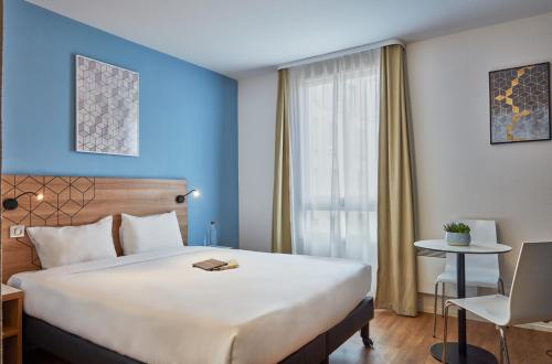 Imagen de la habitación del Aparthotel Adagio Access Paris Quai D'ivry. Foto 12
