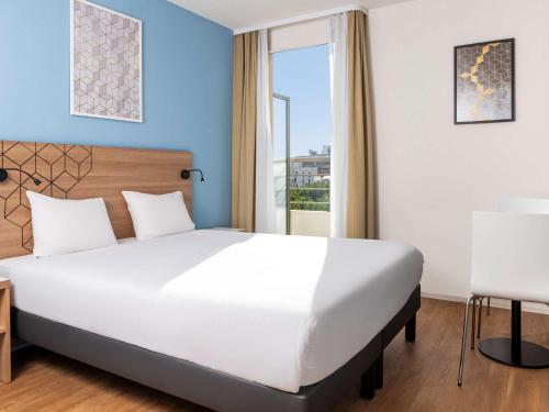 Imagen de la habitación del Aparthotel Adagio Access Paris Quai D'ivry. Foto 13