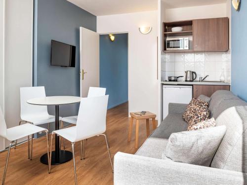 Imagen de la habitación del Aparthotel Adagio Access Paris Quai D'ivry. Foto 17