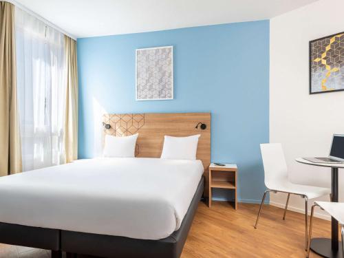 Imagen de la habitación del Aparthotel Adagio Access Paris Quai D'ivry. Foto 19