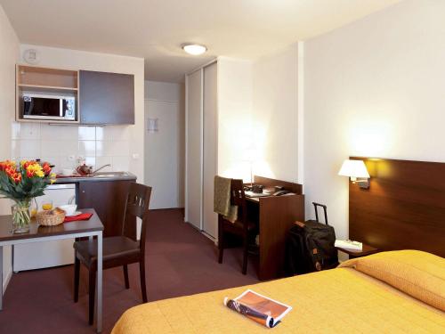 Imagen de la habitación del Aparthotel Adagio Access Paris Saint Denis Pleyel. Foto 12