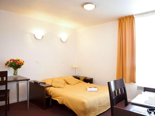 Imagen de la habitación del Aparthotel Adagio Access Paris Saint Denis Pleyel. Foto 18