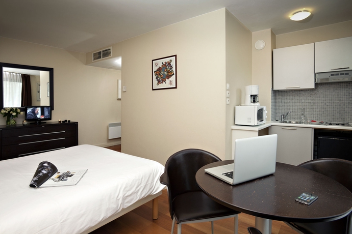 Imagen de la habitación del Aparthotel Adagio Access Paris Tour Eiffel Saint Charles. Foto 12