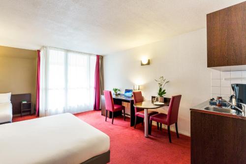 Imagen de la habitación del Aparthotel Adagio Access Paris Vanves Porte De Versailles. Foto 13