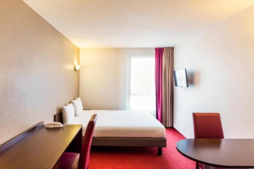 Imagen de la habitación del Aparthotel Adagio Access Paris Vanves Porte De Versailles. Foto 14