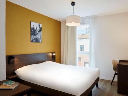 Imagen de la habitación del Aparthotel Adagio Access Poitiers. Foto 10