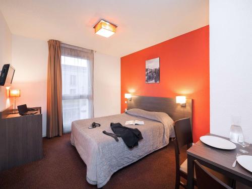 Imagen de la habitación del Aparthotel Adagio Access Poitiers. Foto 17