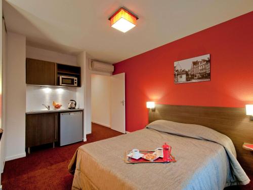 Imagen de la habitación del Aparthotel Adagio Access Poitiers. Foto 19