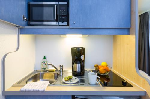 Imagen de la habitación del Aparthotel Adagio Access Rennes Centre. Foto 10