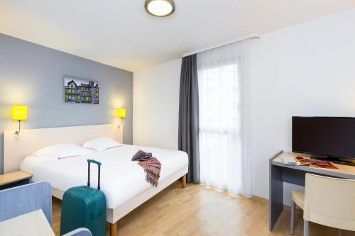 Imagen de la habitación del Aparthotel Adagio Access Rennes Centre. Foto 11