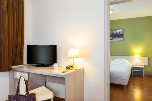 Imagen de la habitación del Aparthotel Adagio Access Rennes Centre. Foto 18