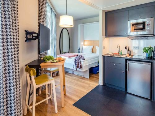Imagen de la habitación del Aparthotel Adagio Access Stuttgart Airport Messe. Foto 14