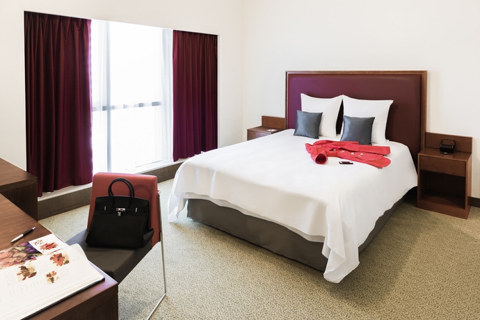 Imagen de la habitación del Aparthotel Adagio Fujairah. Foto 12