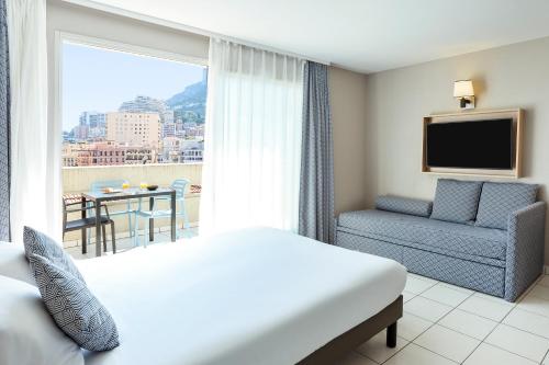 Imagen de la habitación del Aparthotel Adagio Monaco Monte Cristo. Foto 13